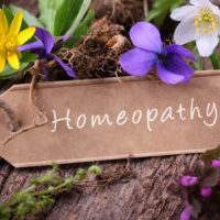 Homeopathy - Flowering medicinal herbs and label